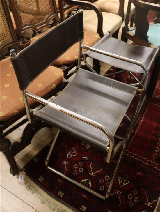 A 1950s chromed metal folding open armchair and matching stool